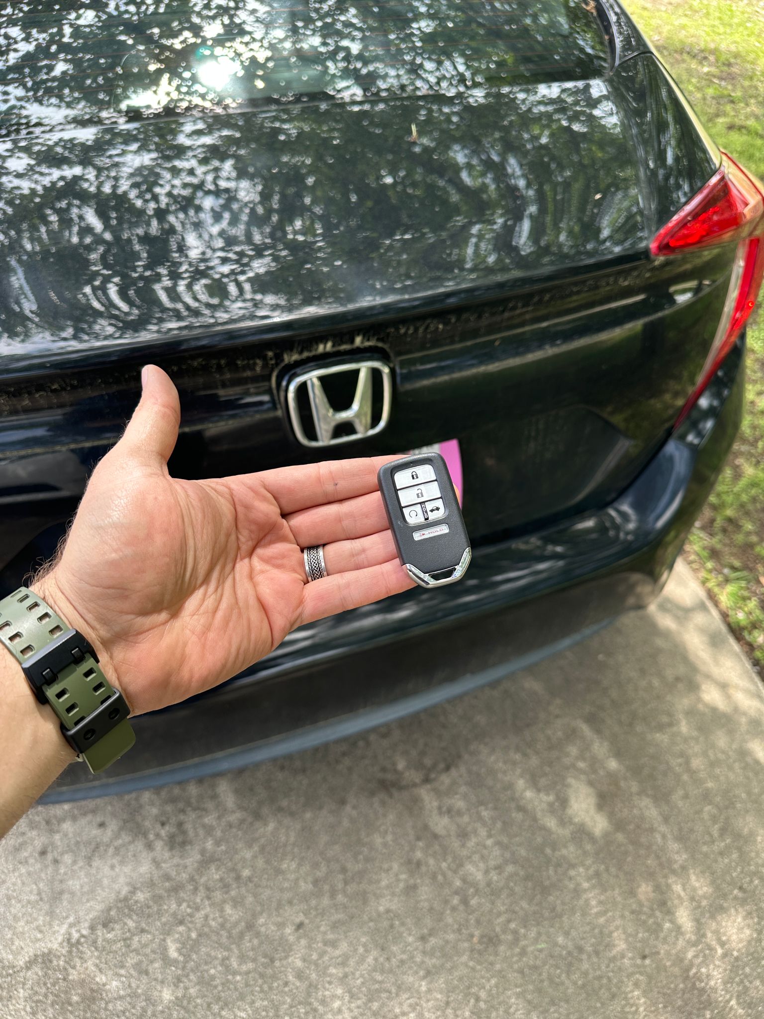 Car Key Locksmith in Raleigh working on a vehicle
